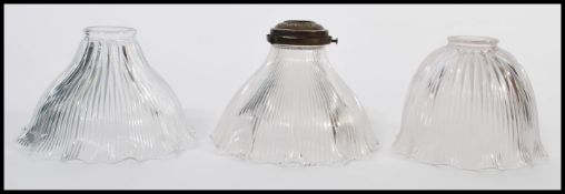 A collection of early 20th Century door furniture to include brass door handles, a brass back plate,