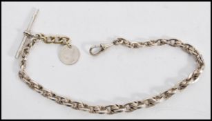 A 19th century silver hallmarked pocket watch albert chain having a T bar clasp with Victorian