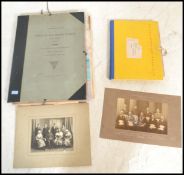 A collection of sundry watercolours prints and photographs held within two portfolio folders