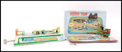 VINTAGE TIN PLATE MECHANICAL CLOCKWORK TOY MODEL RAILWAYS