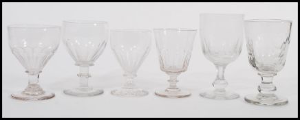 A harlequin set of six 18th/19th century wine / rummer glass glasses each raised on a circular