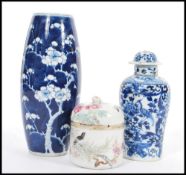 A group of 19th century Chinese ceramics comprising of a tall blue and white prunus pattern vase,