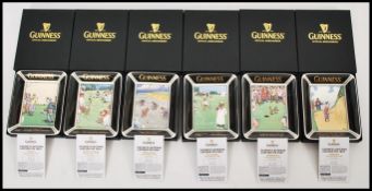 A set of six Guinness advertising ceramic pin trays each featuring Bateman Cartoons. Includes Pebble