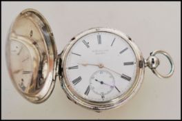 A 19th century Victorian silver hallmarked full hunter pocket watch having a key wind movement.
