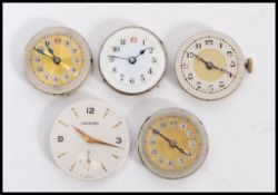 A group of vintage watch movements to include a Garrard with subsidiary dial, example with white