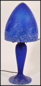 After Emile Galle - An Art Nouveau style glass desk / table lamps in a matt navy blue and dark