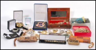 A selection of vintage costume jewellery to include beaded necklaces, simulation pearls, earrings (