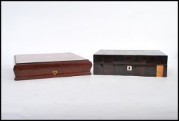 A 19th century George III rosewood inlaid ladies jewellery box. The hinged inlaid top opening to