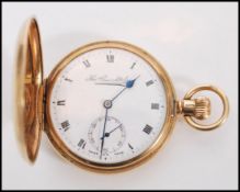 A vintage 20th century hallmarked 9ct gold full hunter pocket watch by Thos Russel and Son