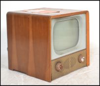 A 1950's walnut cased original television set ( tv ) by Sobell. Complete with glass intact, dials to