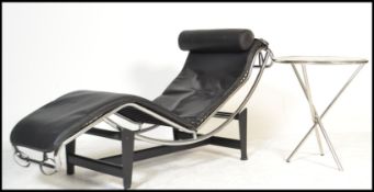 A modern Italian chrome metal framed LC4 adjustable chaise lounge after Le Corbusier, upholstered in