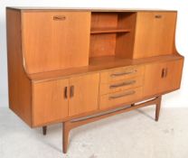 A 1970's G-Plan highboard sideboard in the Sienna pattern. Raised on tapering legs with a series