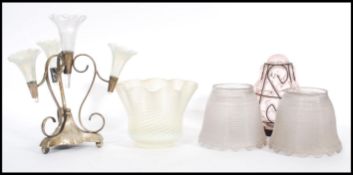 A selection of glasswares to include a silver white metal epergne centrepiece having glass trumpet