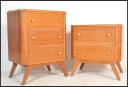 A mid 20th Century matching oak chest of drawers, the graduating drawers in a run of two and a run