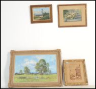 A group of artwork and paintings to include a still life of flowers, a signed watercolour view of St