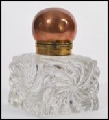 A large 19th Century Victorian partners desk ink pot / well of square form with swirl design