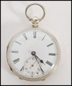 A 19th century Victorian silver hallmarked pocket watch having a fusee movement. The white enamel