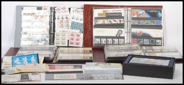 A good selection of First Day Issues over five albums, British stamps including the Royal Mail