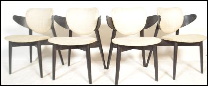 A set of four contemporary dining chairs designed by Stolar Gottfrid for Ikea, the ebonised