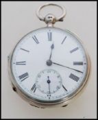 A 19th century Victorian silver hallmarked pocket watch having a fusee movement. The white enamel
