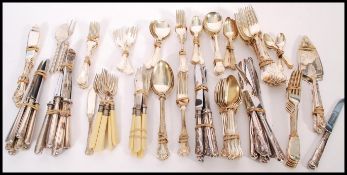A collection of silver and silver plated flatware to include a set of six silver hallmarked