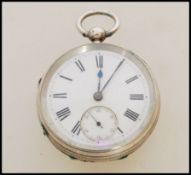 A 19th century Victorian silver hallmarked pocket watch having a fusee movement. The white enamel