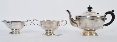 An early 20th century silver hallmarked three piece tea service by Marson & Jones Birmingham 1931.
