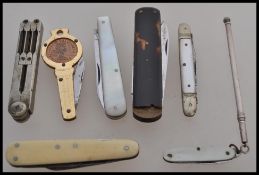 A collection of vintage 20th Century folding knives to include tortoiseshell, mother of pearl