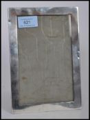 An early 20th century silver hallmarked photo picture frame of plain rectangular form. Hallmarked