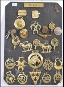 A collection of vintage 20th Century ( possibly earlier ) horse brasses and adornments, to include