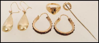 A 9ct gold ladies ring with unusual mathematical symbols to front together with a pair of 9ct gold