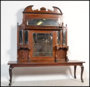 A late 19th Century Victorian classical revival rosewood and marquetry inlaid panelled mirror back