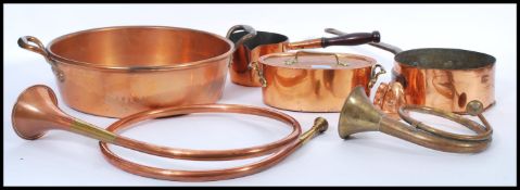 A good collection of 19th and 20th Century brass and copper pans to include riveted examples