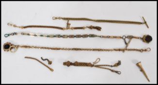 A group of vintage early 20th century pocket watch albert chains to include mostly yellow metal