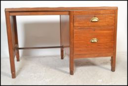 A vintage mid 20th Century Air Ministry single pedestal desk, the single pedestal of three