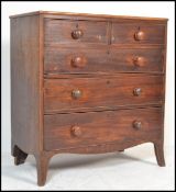 A Georgian 19th century mahogany chest of drawers having knob handles with a two short over three