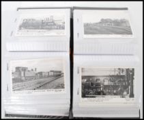 RAILWAY. Two albums of black and white photographic postcards featuring Railway Locomotives (170).