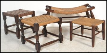 A collection of four vintage 20th Century footstools, to include three with rattan weave seat pads