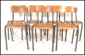 A run of 7 mid 20th century retro tubular metal and plywood stacking chairs - dining chairs of