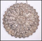 A vintage 20th Century wall hanging silver hallmarked Continental mirror, scalloped edge with