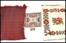 A collection of South American handmade woven wool floor rugs, each decorated with geometric designs