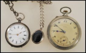An early 20th century silver continental ladies open faced pocket / fob watch set to an albert chain