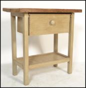A rustic country limed pine side / occasional table, constructed with square supports united by