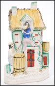 A rare 19th Century Victorian Staffordshire flat back novelty fairing of a house / inn depicting a