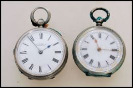 Two 19th century small ladies silver pocket fob watches both having white enamel faces with Roman