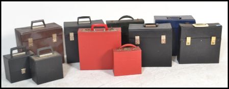 A collection of retro and vintage 20th Century record storage cases, the cases for 7