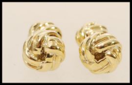 A pair of gentleman's gold plated knot cufflinks. Weight approx 9.9g.