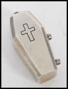 A sterling silver 925 pill box pendant in the form of a coffin with hinged lid and cross crucifix