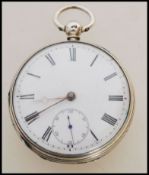 A 19th century Victorian silver hallmarked pocket watch having a fusee movement. The white enamel