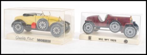 Two Carlton ware china cars of advertising interest to include a yellow 'bull nose Morris'